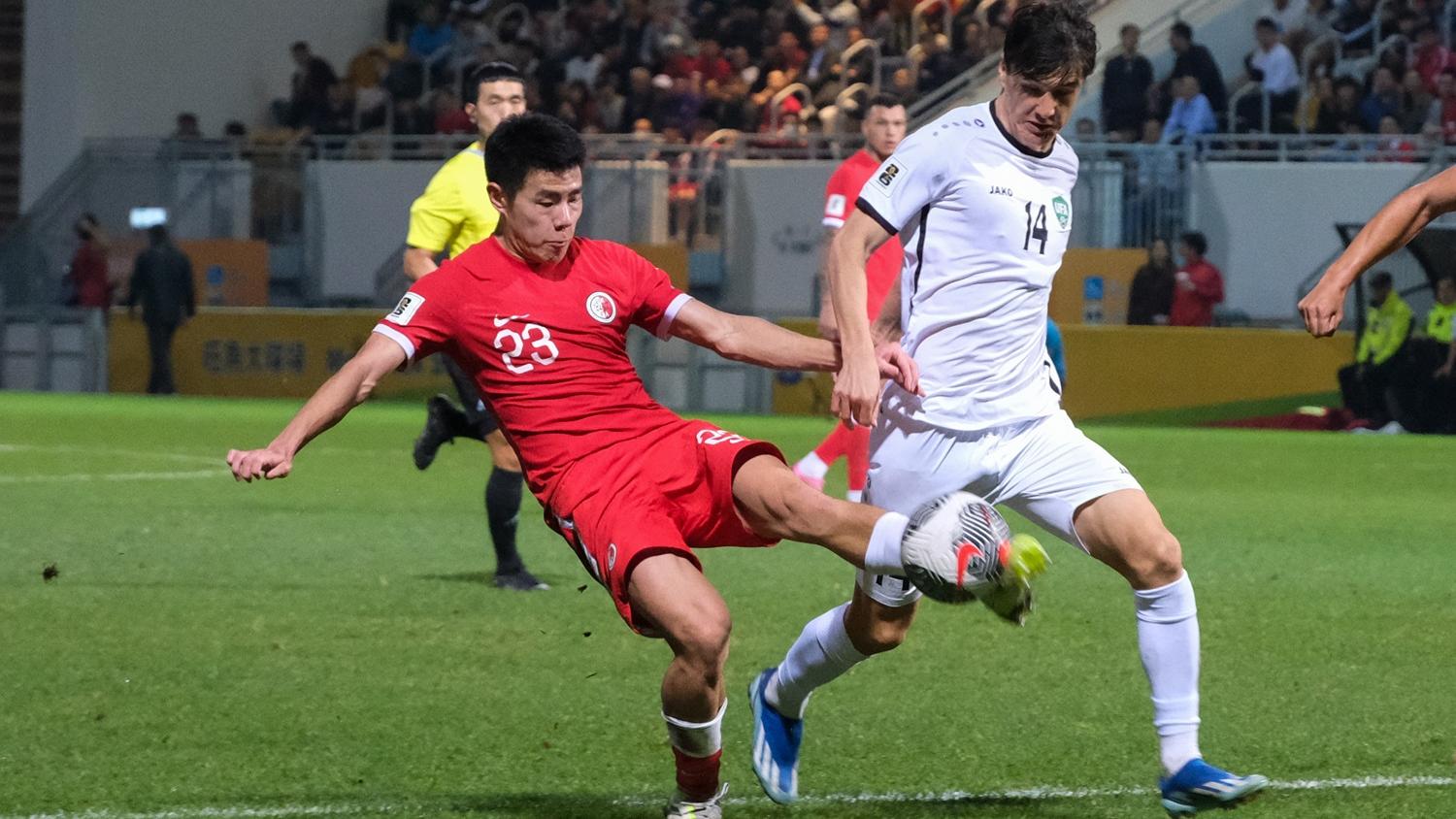 香港隊在世界盃外圍賽不敵烏茲別克。(中新社)