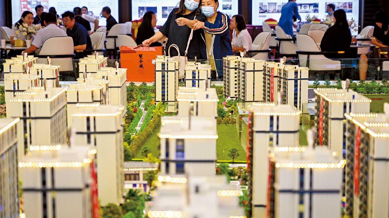 Ａ股振奮｜中央傳出手救樓市 國企或低價掃入內房庫存