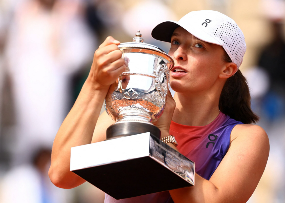 施維雅迪（圖）第五度捧走大滿貫，亦是繼沙莉絲及軒寧後，公開賽時代第三位完成法網三連冠的女單球手。（路透社）