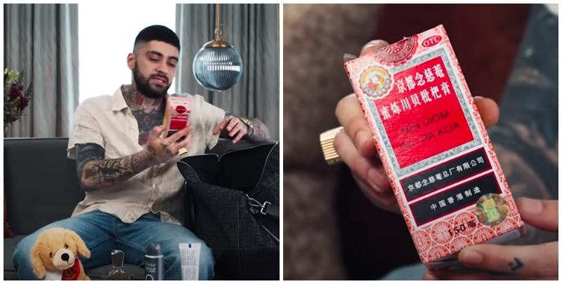 Zayn Malik分享他行李袋的隨身物品，有一樽以中文字標明香港製造的京都念慈庵川貝枇杷膏。