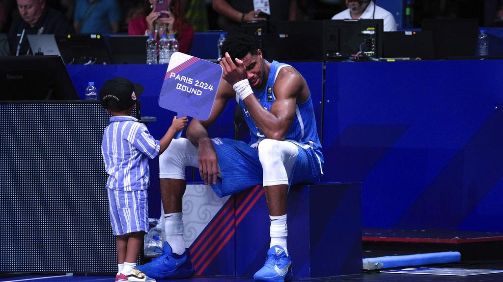 帶領希臘打入奧運，安迪杜甘普一度感觸。(美聯社)