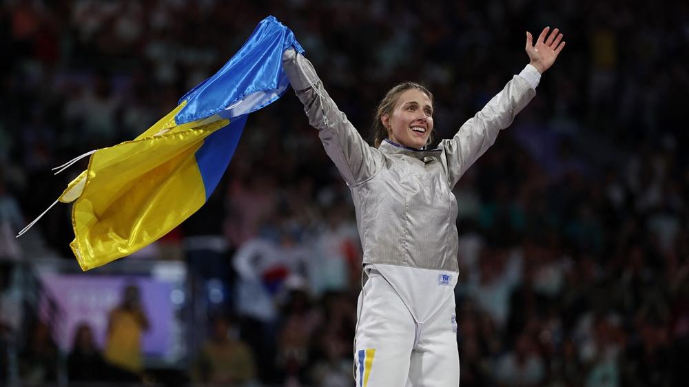 卡蘭為烏克蘭女子佩劍隊贏得金牌。(路透社)