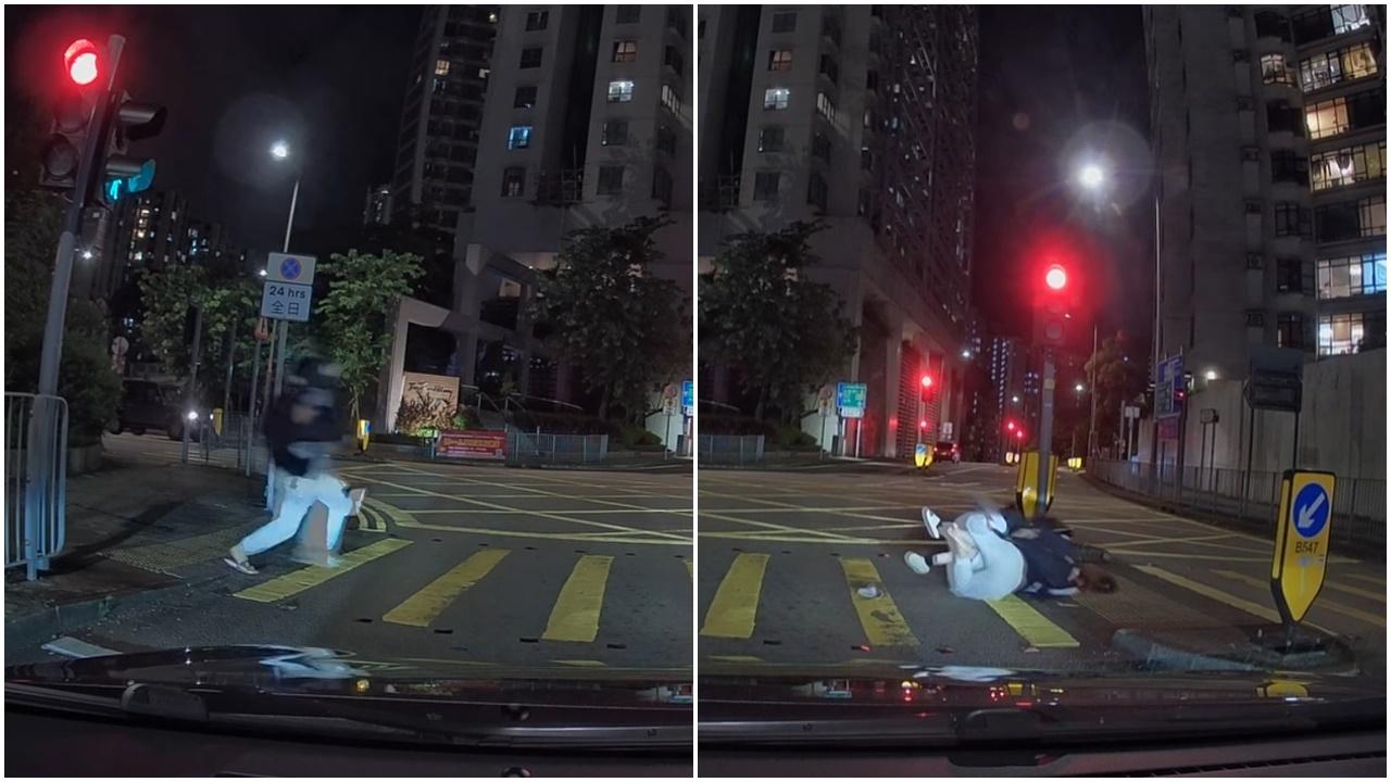 車Cam直擊｜拖鞋男抱女衝過馬路跌倒