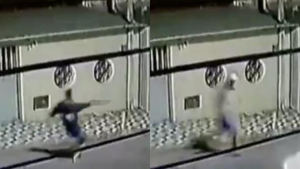 閉路電視拍到槍手在路上追殺費利克斯。(互聯網)