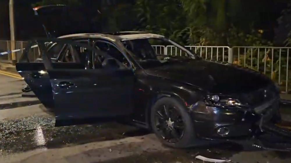 青衣私家車焚燒，消防撲滅發現助燃劑列縱火。(電視截圖)