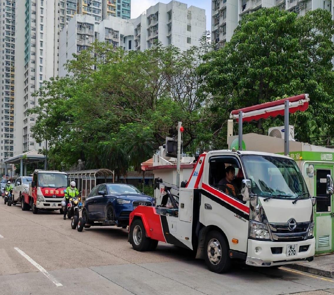 西九龍警區交通日，拖22部違泊車輛。(警方圖片)