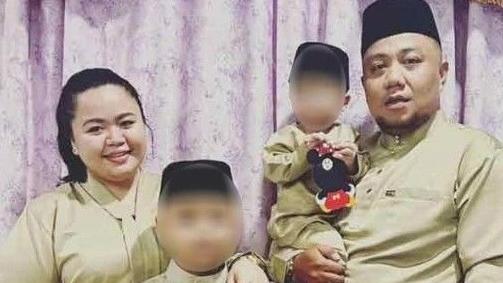 阿末法漢生前與妻子和年幼兒子合照。(互聯網)