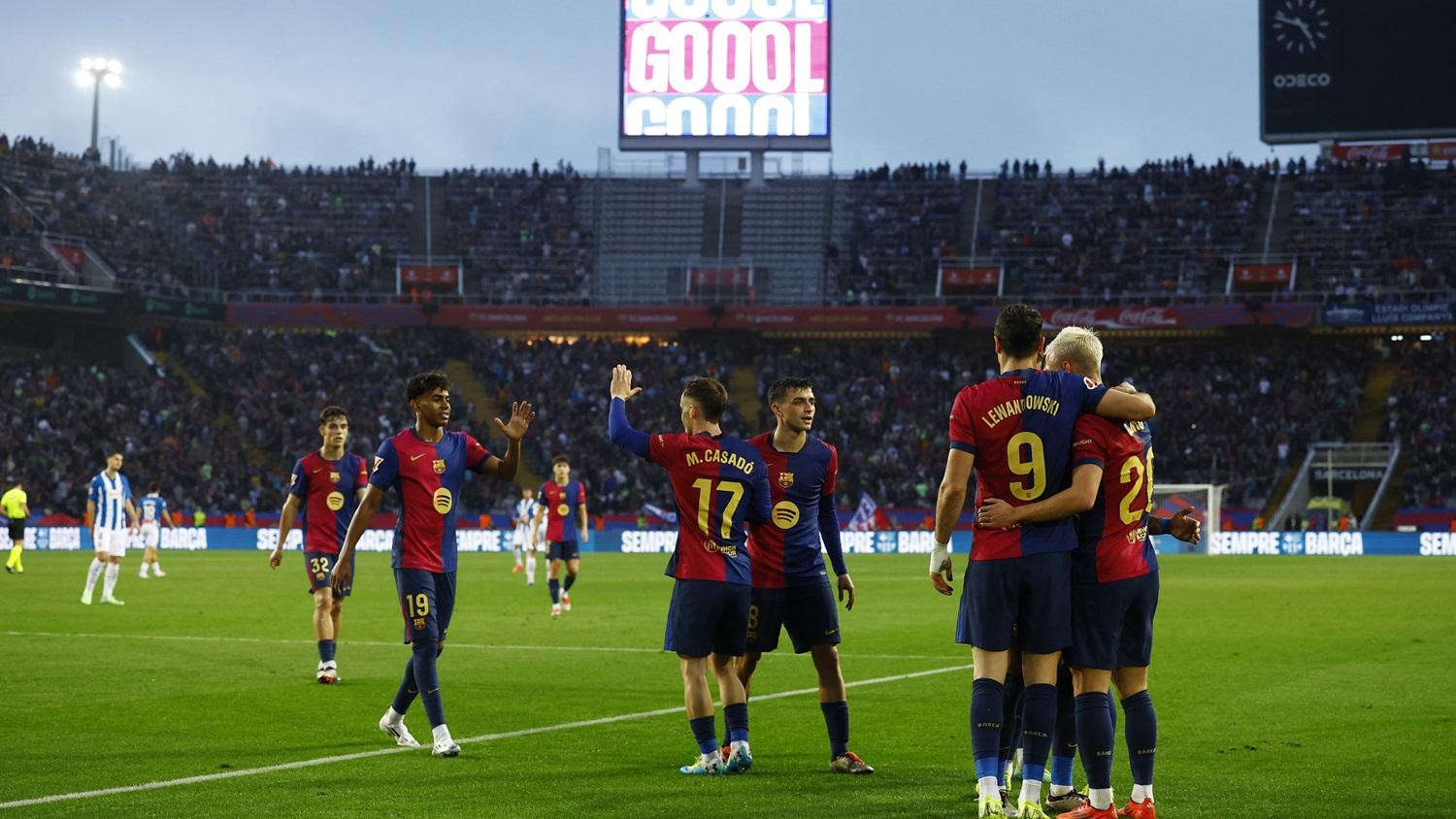 巴塞隆拿原計劃會將對馬德里體育會聯賽移師美國舉行。(路透社)