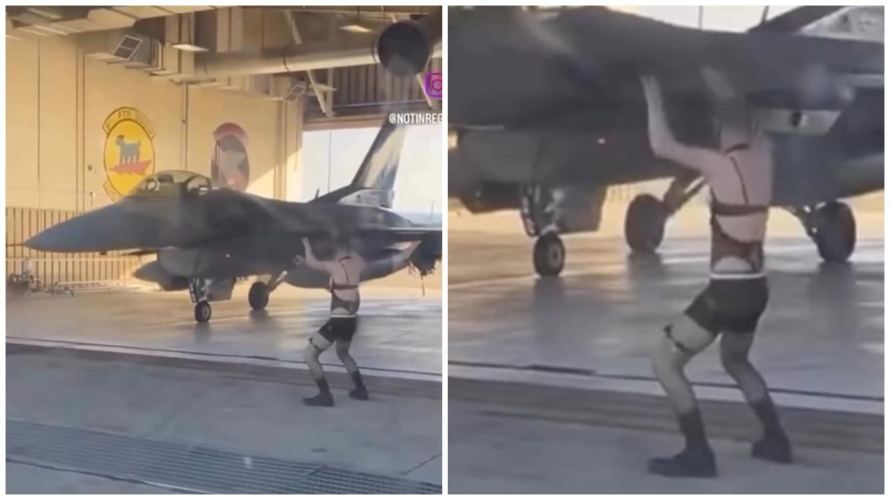 美空軍基地地勤性感裝跳艷舞引導戰機，網民：一堆笨蛋。(IG)