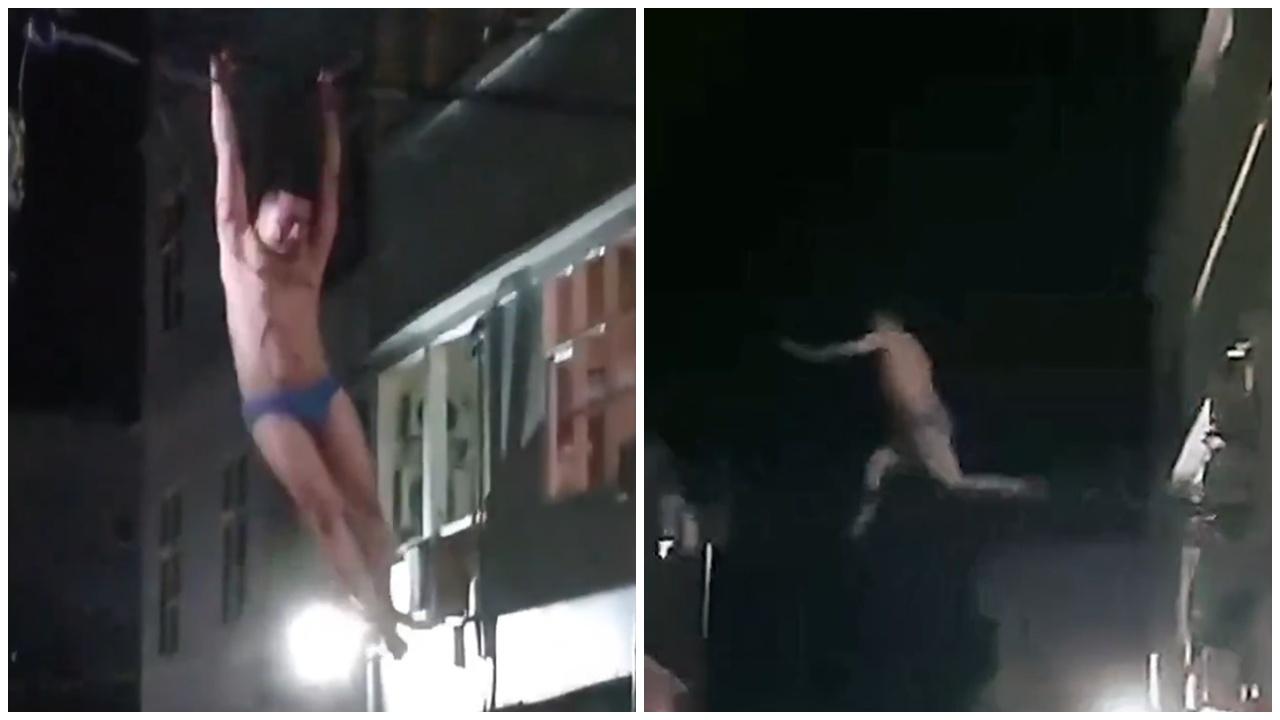 底褲男疑逃避捉姦，如泰山攀爬電纜半空吊吊揈。(X)