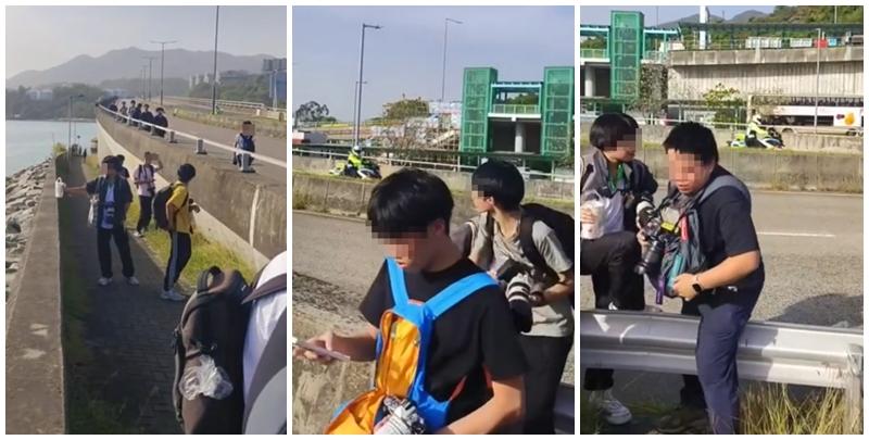 約20名少年巴士迷在大欖青山公路一帶企出公路影相，其間被兩名鐵騎交通警員驅趕。(影片截圖)