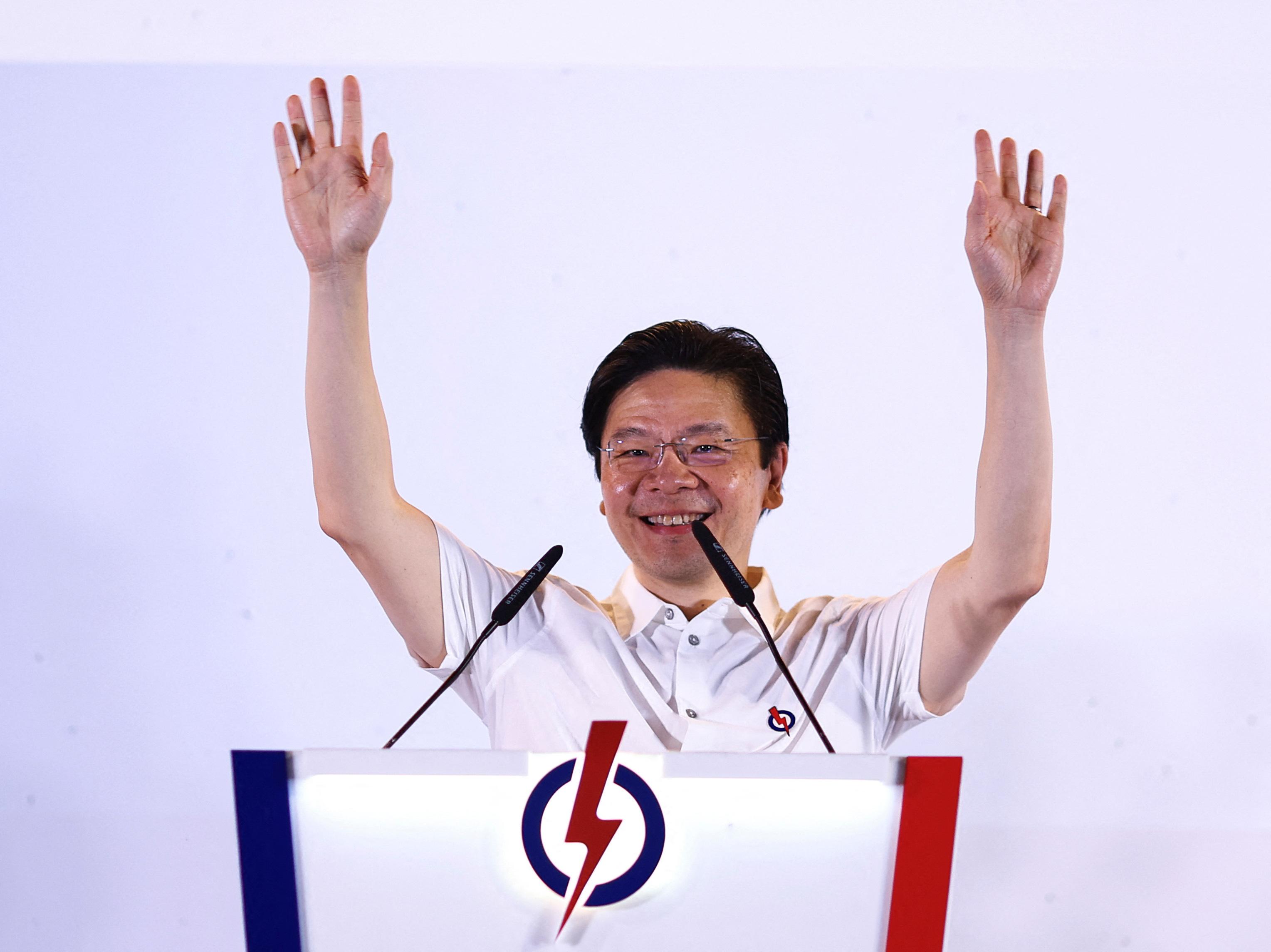 黃循財承諾不論選民投票取向，人民行動黨都會為全民服務。（路透社）