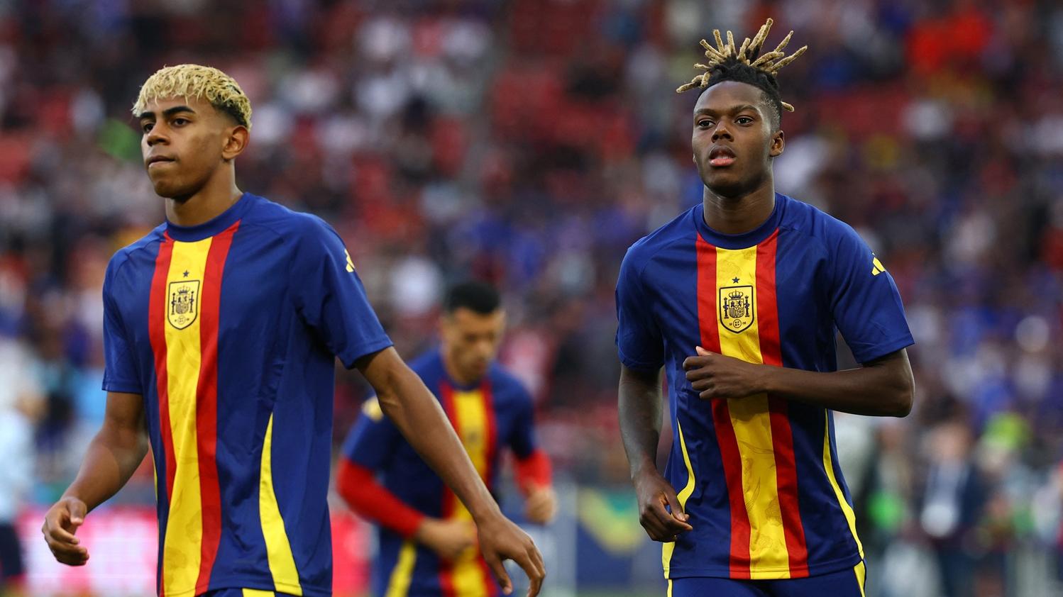 西班牙的耶馬爾與尼高威廉斯。(路透社)