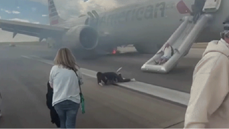 美國航空波音客機跑道冒煙起火 173乘客驚險逃生(有片)