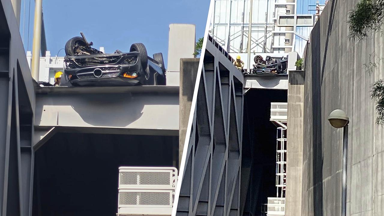 私家車險墮青馬大橋橋下。(網民Barry Kwong@FB群組「車cam L(香港群組)」)