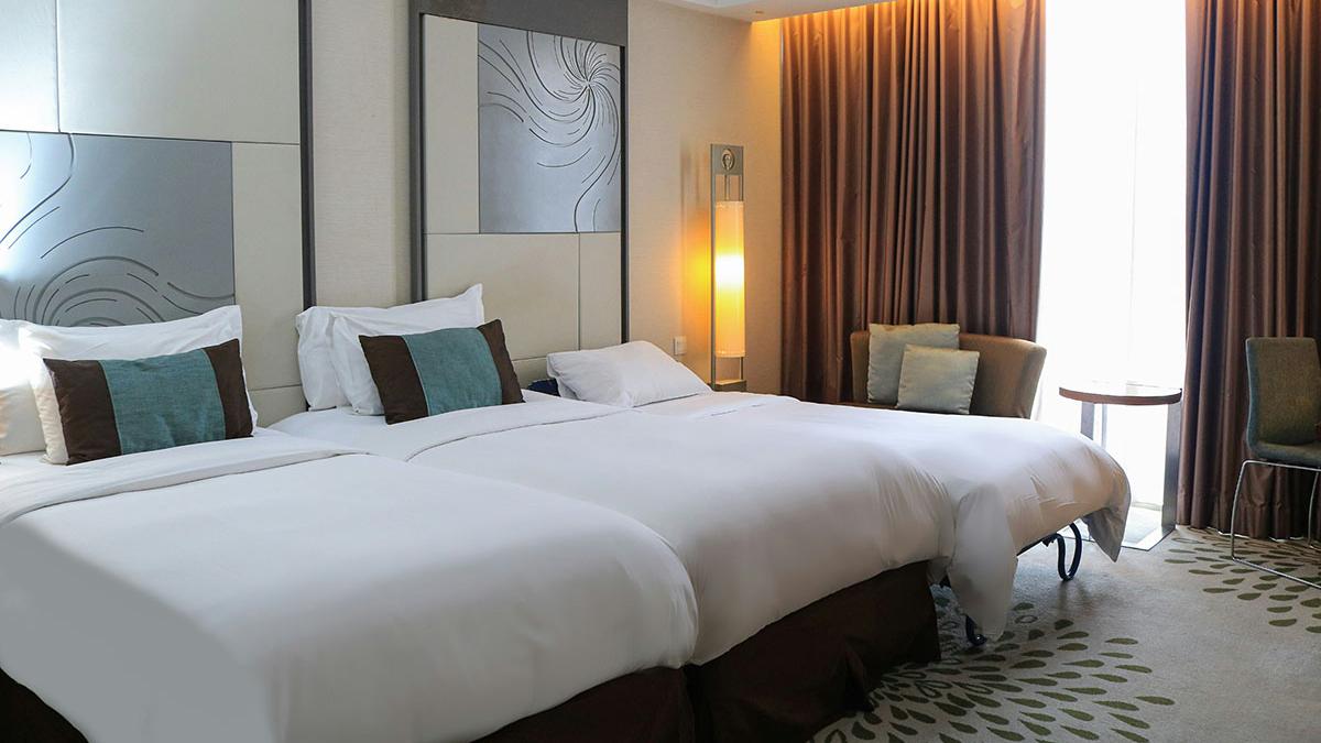 有酒店業界透露，棉被攝床褥可向客人證明沒有人睡過這張床。(Unsplash圖片)