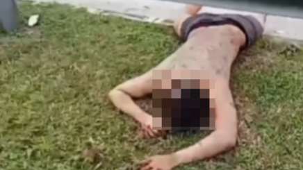 男子行為異常趴在草地上吃泥土。（圖／翻攝網絡）