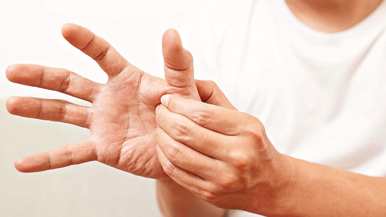 常見手指痛症—彈弓指