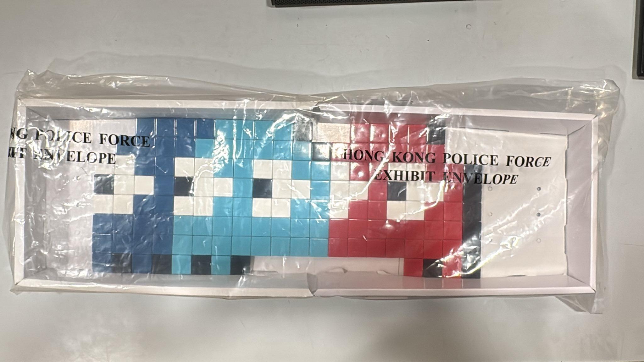 尖沙咀商場5萬元藝術品被盜，警查天眼拘兩外籍男女。