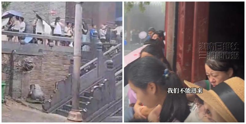 少林寺景區被暴雨覆蓋，但不少遊客反映，諾大的寺廟內沒有一處可供遊客避雨的場所，想進入立雪亭被拒絕。(影片截圖)