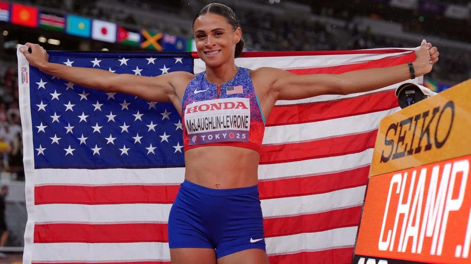 美國跑手麥洛蓮打破大會女子400米紀錄。(路透社)