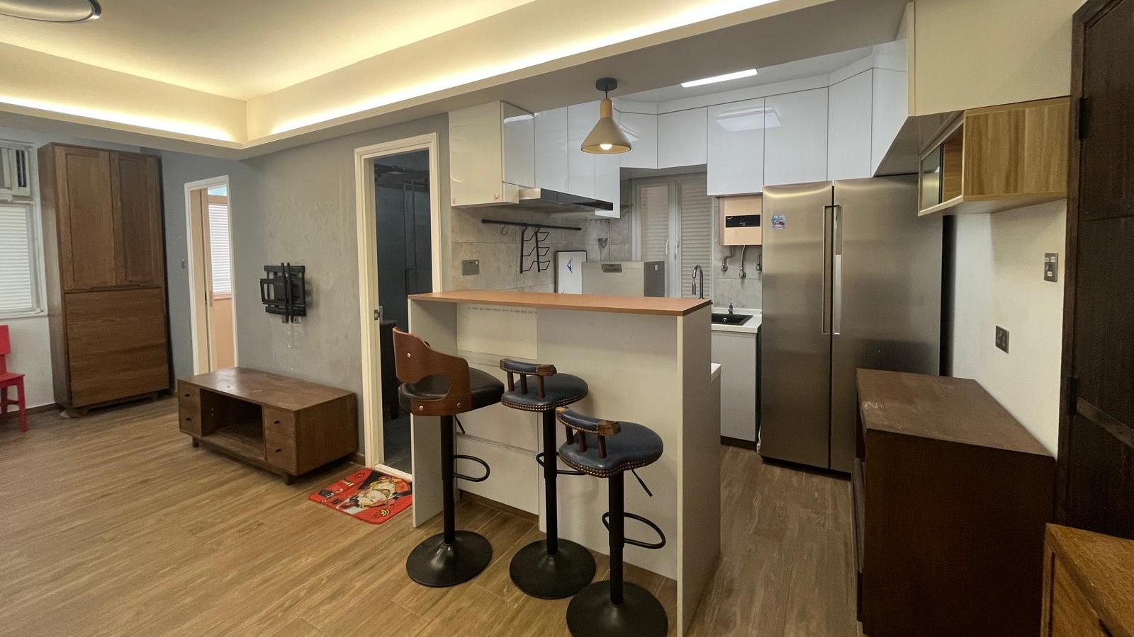 單位廚房採開放式設計，增加大廳空間感。