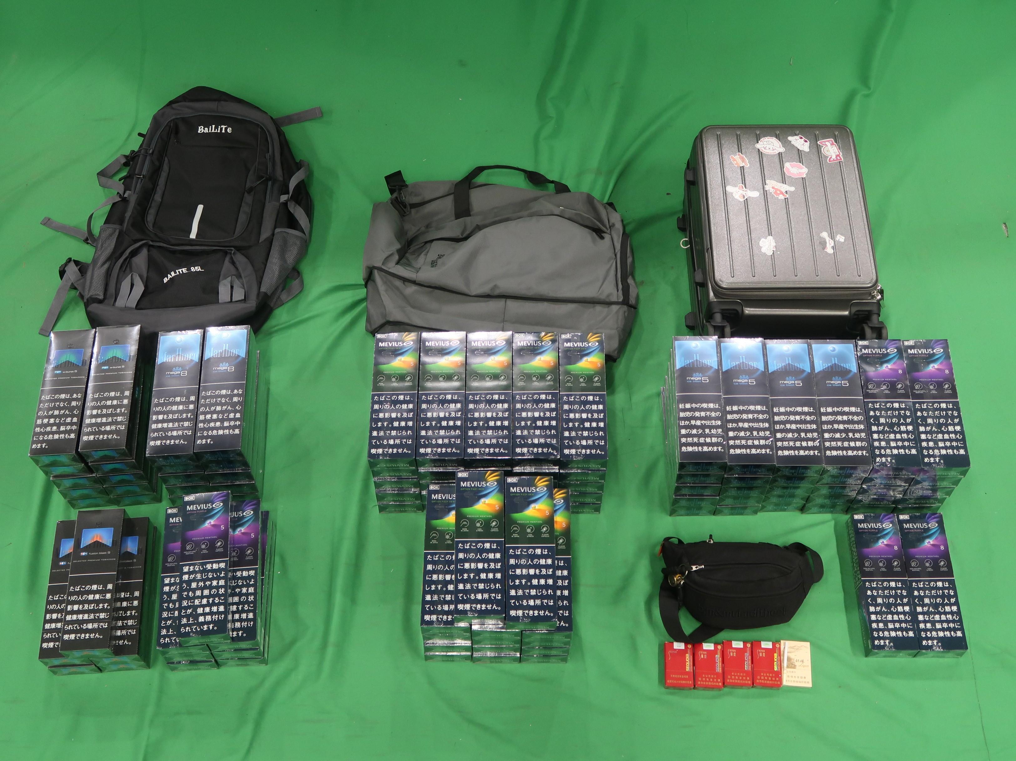 29歲男旅客攜9.3萬元私煙入境，判囚4個月兼罰款2000元。(政府新聞處)