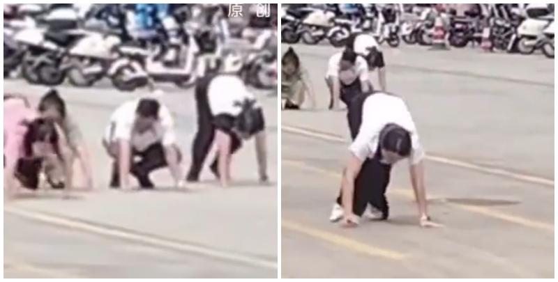 廣東惠州近日流傳一段「企業要求員工當街學狗爬」影片，引發網民熱議，及後證實為一間公司組織團建活動時發生的行為，目前，涉事企業已就事件公開致歉  (影片截圖)