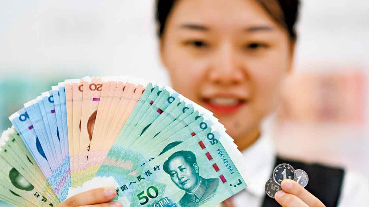 離岸人民幣升穿7算 官媒急降溫拒大幅升值