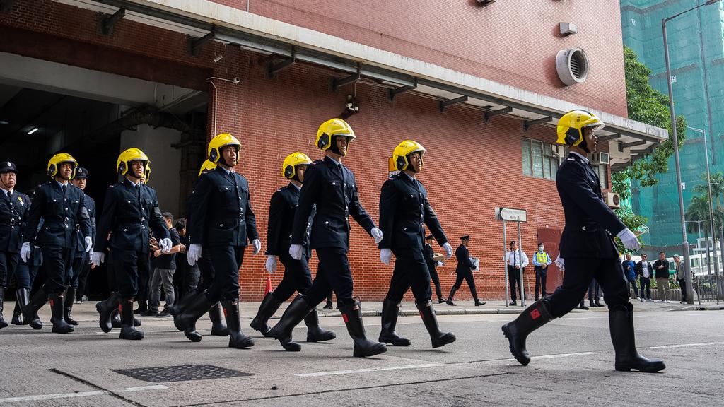 殉職消防員何偉豪出殯。(美聯社)