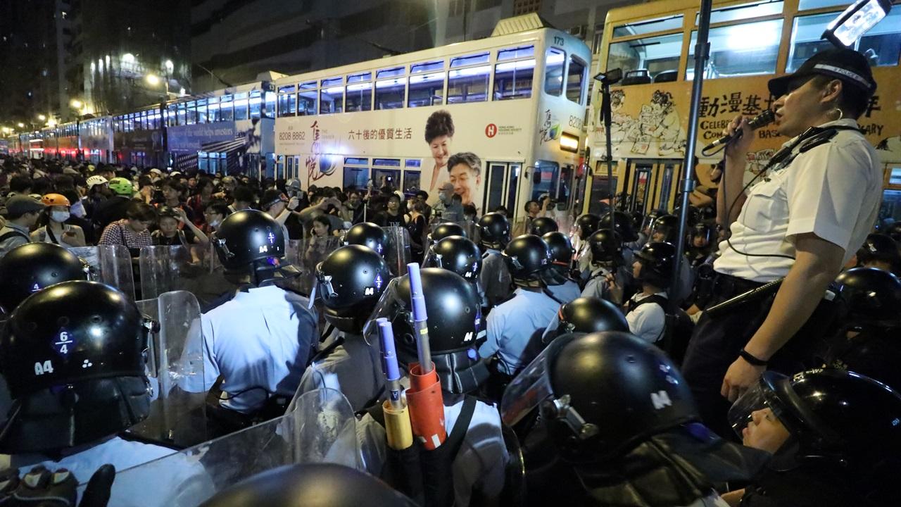香港眾志社民連成員涉去年中聯辦示威被捕