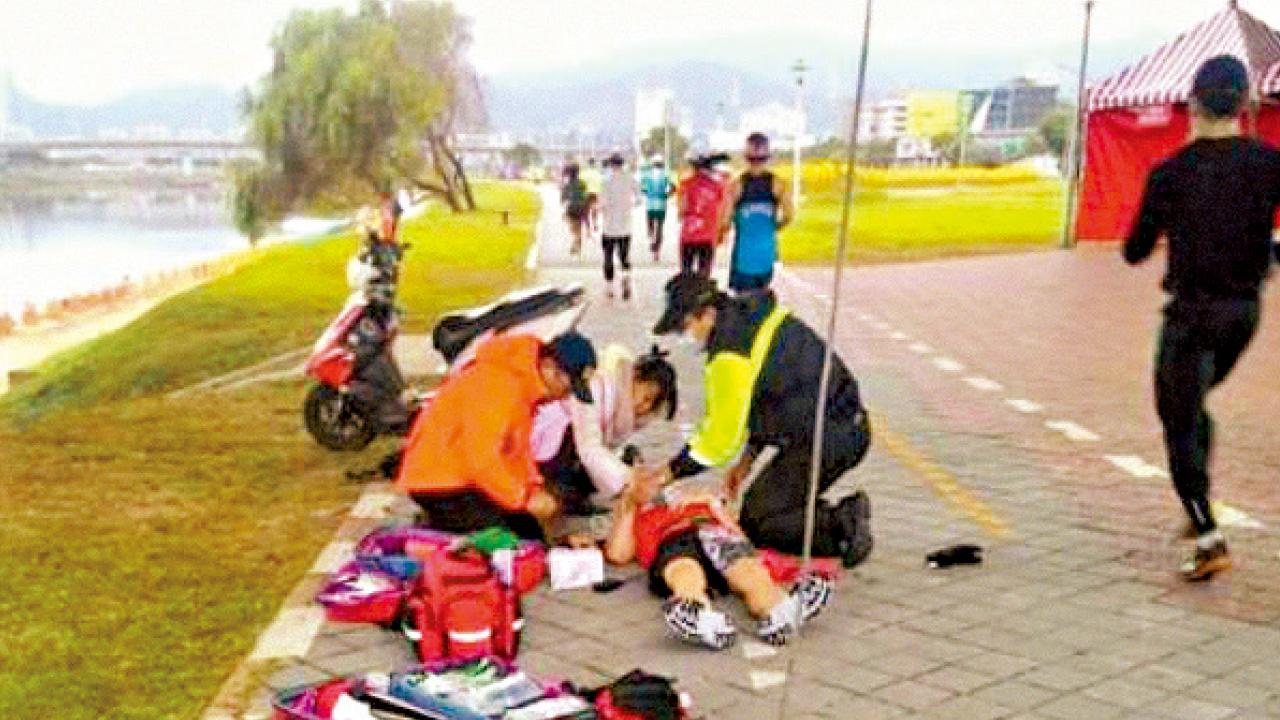 台北渣馬飛來橫禍 天降馬達砸中跑手頭