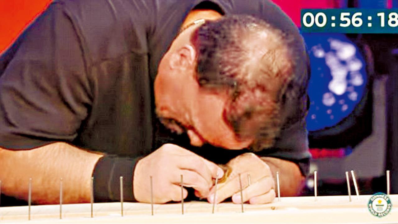 鐵頭男額可鎚釘