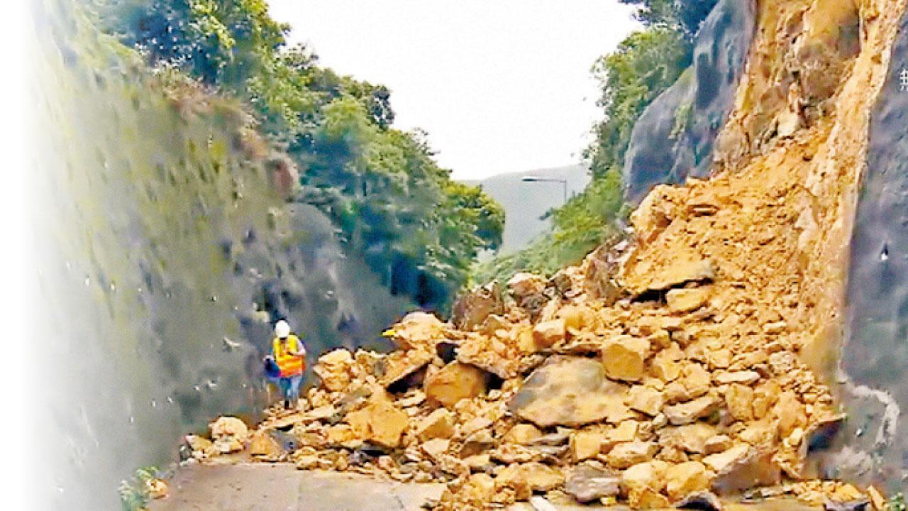 風暴後續外圍雨帶影響 大潭道山泥傾瀉全線封