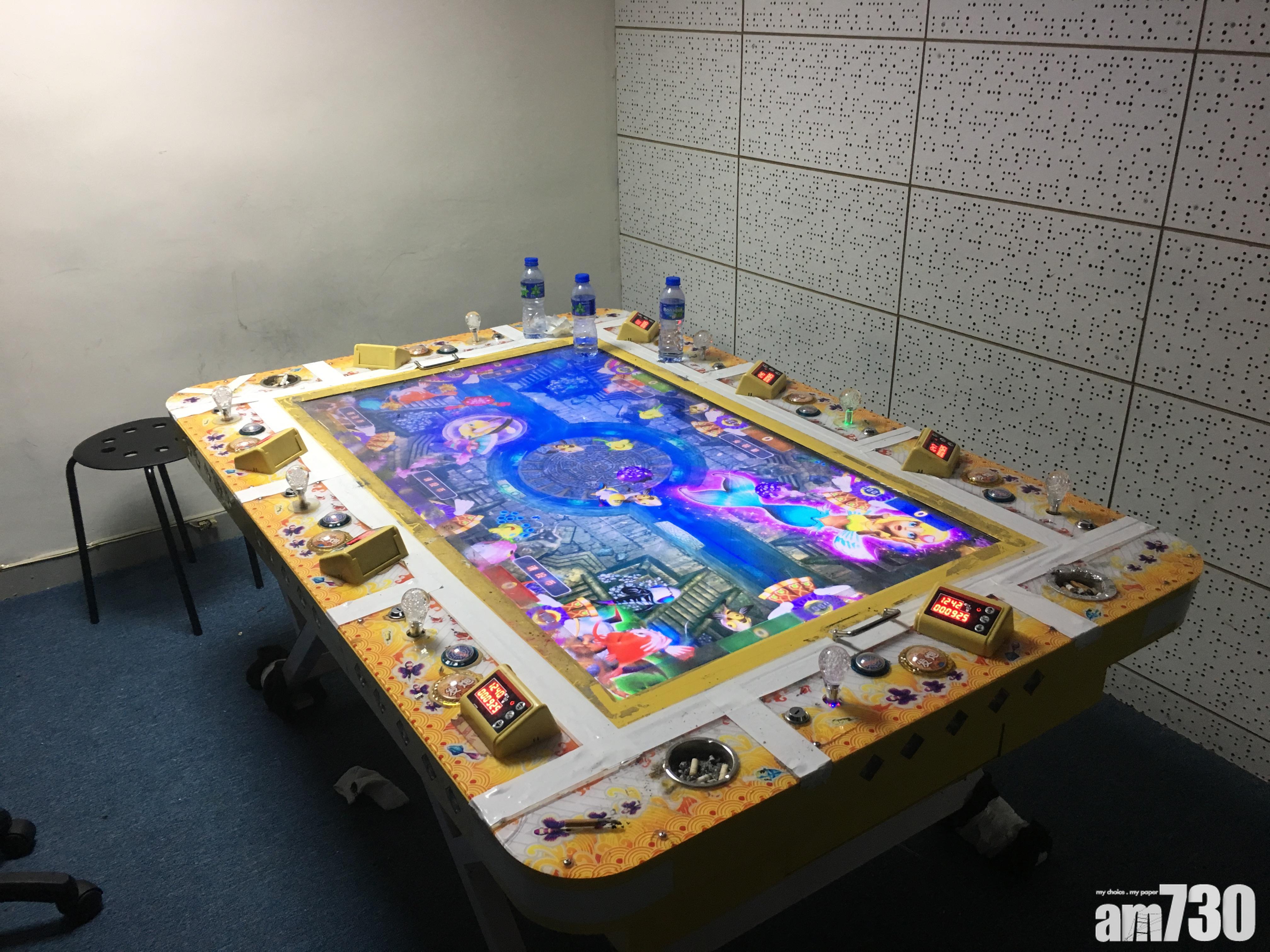 警方北角破非法釣魚機賭檔拘9男女