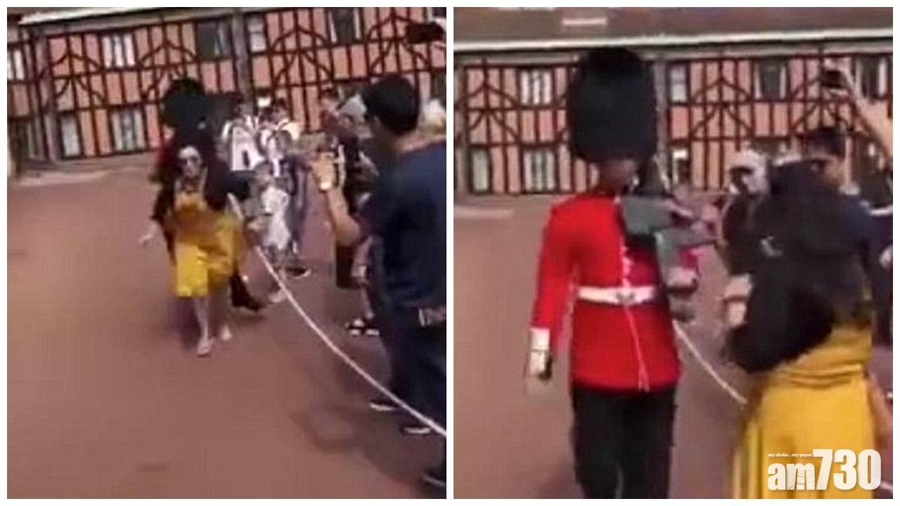 【有片】英國御林軍前進受阻  一掌推開女遊客