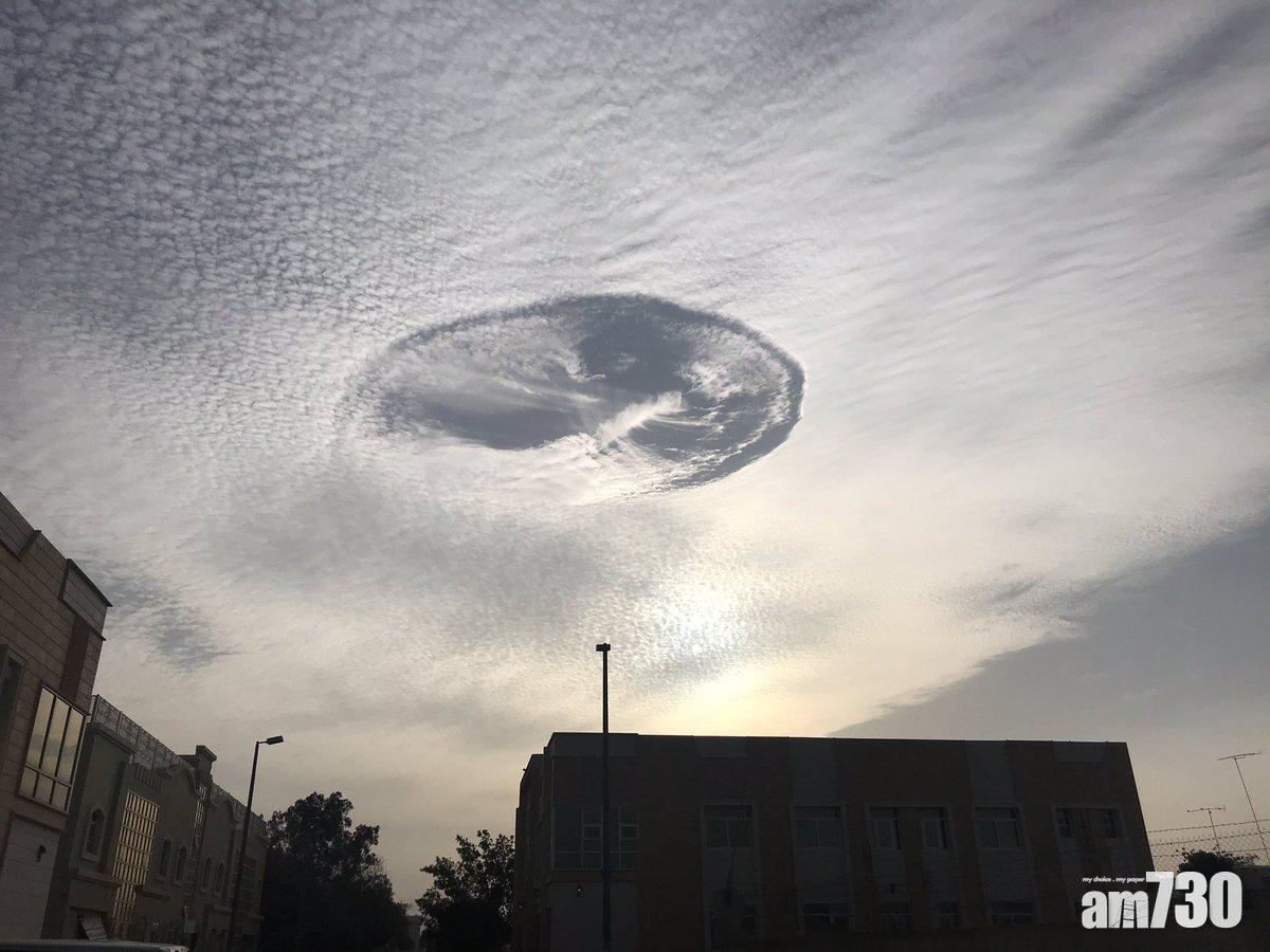 【奇景】阿聯酋雲層「穿窿」 似UFO降落 (有片)