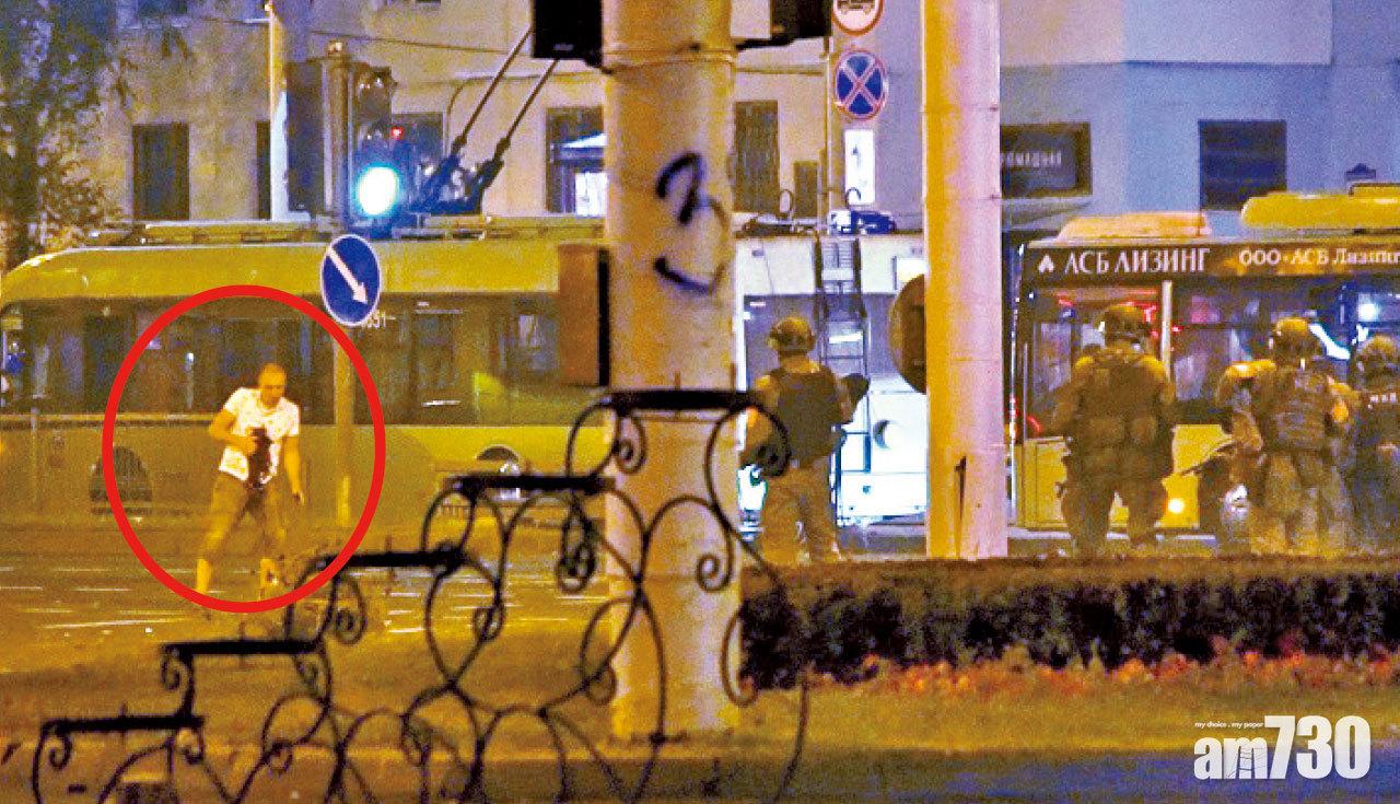 疑點重重  白俄示威者被指炸死自己  妻:胸現縫合疑中槍