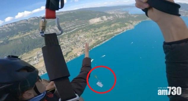 【肉痛】美遊客玩滑翔傘拍美景  失手新iPhone從5000呎跌落湖 