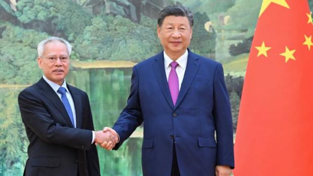 習近平上月在北京會見新當選並獲中央任命的澳門第六任行政長官岑浩輝。(新華社)